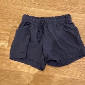 Athleta shorts, size 12/L, dark purplish navy.